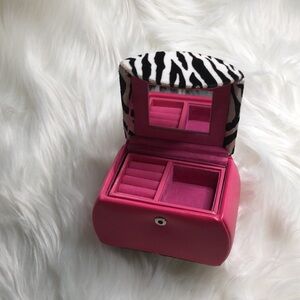 Adorable pink faux leather, black & white zebra fur stripes jewelry purse.